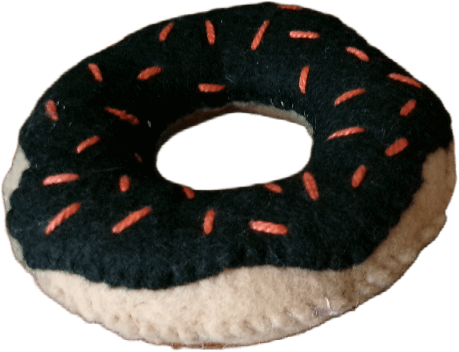 A Halloween donut made of sewn felt.