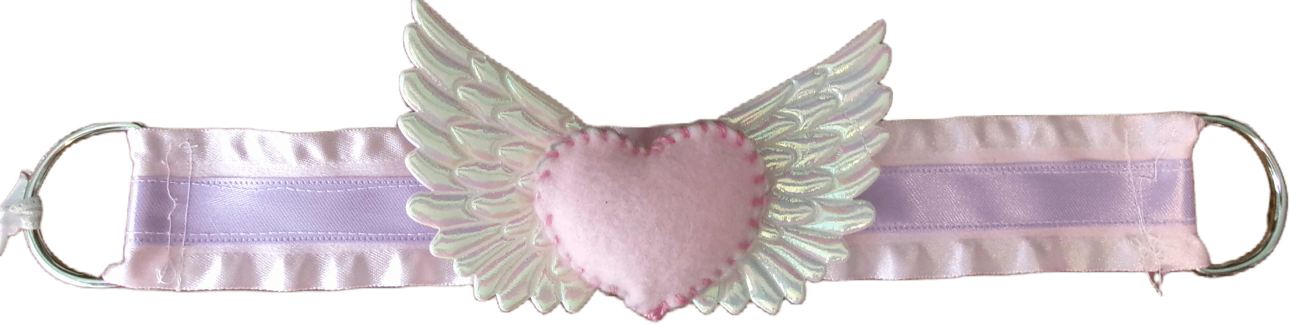 A choker made of pastel ribbon. A heart with wings makes up the centerpiece.